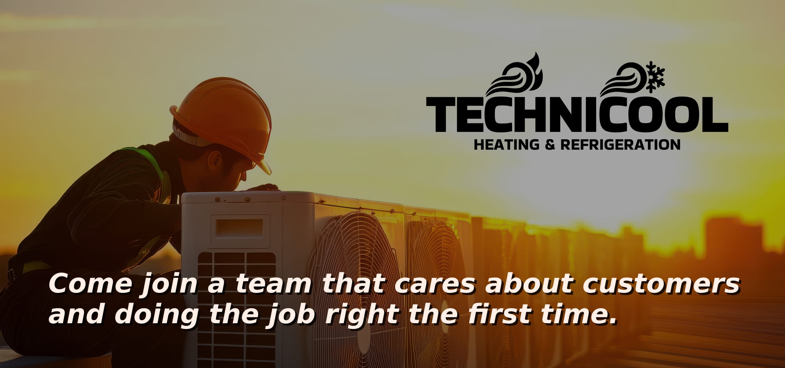 Sunset on a building roof with HVAC equipment.